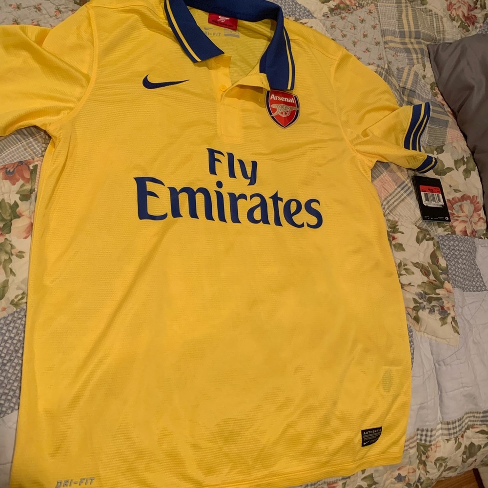 Brand new with tags Yellow Arsenal away jersey